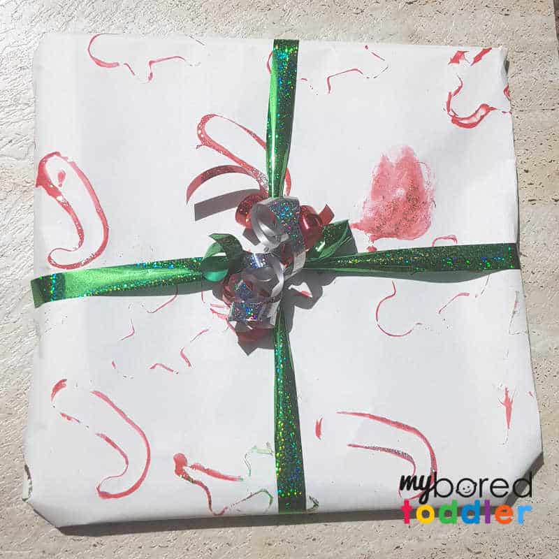 toddler painted christmas wrapping paper finished proudct