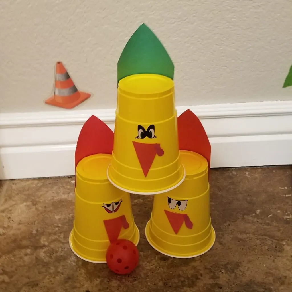 thanksgiving activity - bowling with plastic cup turkeys