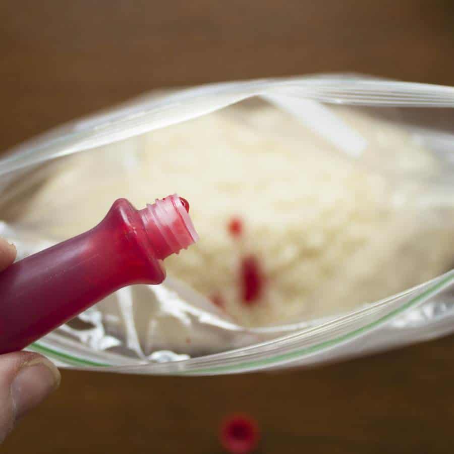 adding food color to make rainbow rice