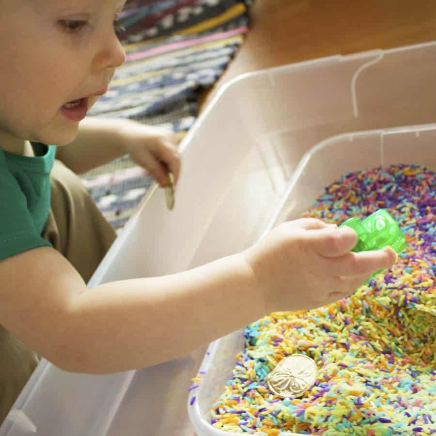 toddler with shamrock leprechaun gold digging st patricks day sensory play