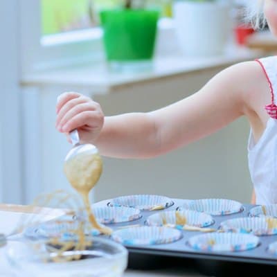 easy berry muffins your toddler can make putting in muffin cases