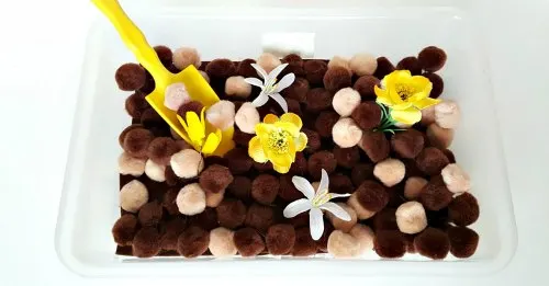 flowers in the sensory bin toddler activity