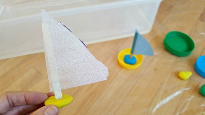 making jar lid boats for toddler water play activity