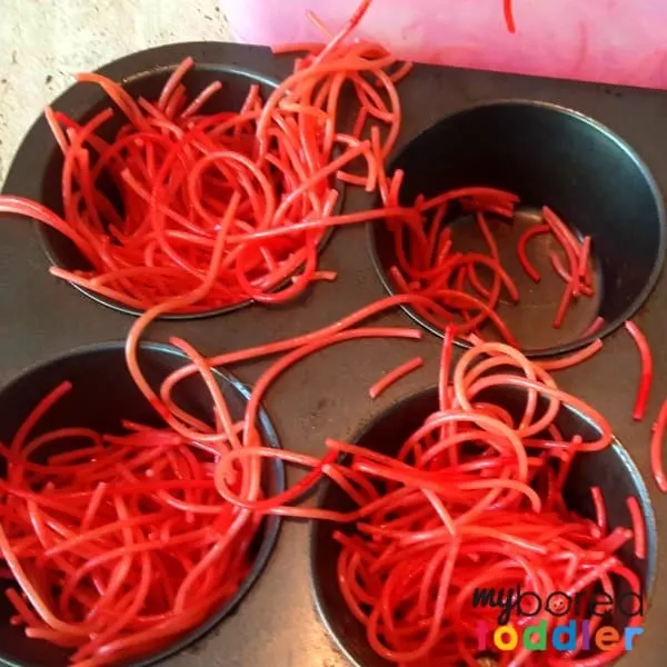 how to make colored spaghetti for messy play sensory play sensory bins 2