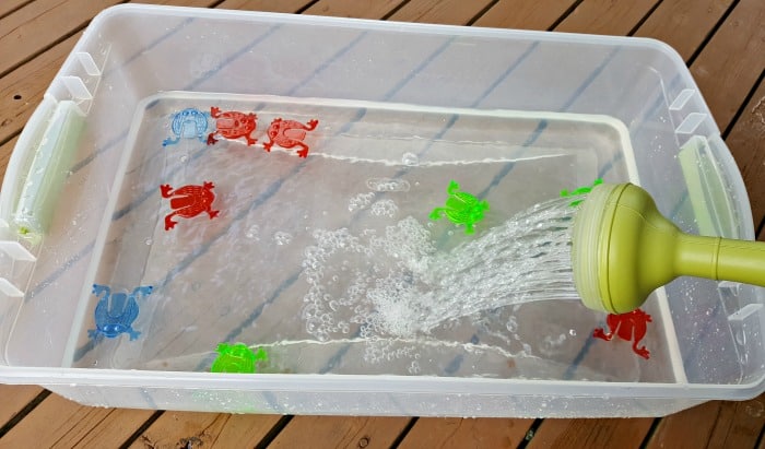 pouring water for fly swatter water play