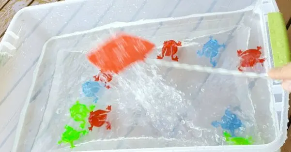 water play with fly swatter