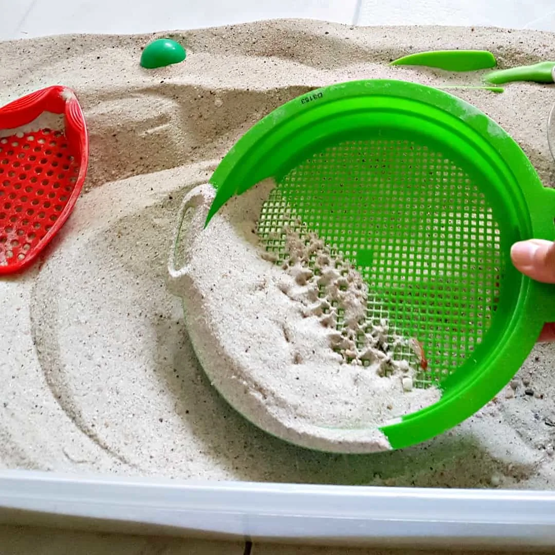 sifters in the sandbox toddler activity fine motor and sensory play