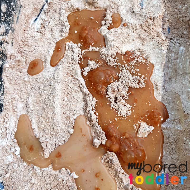 dinosaurs in mud taste safe oobleck for toddlers and preschoolers sensory play sensory bin