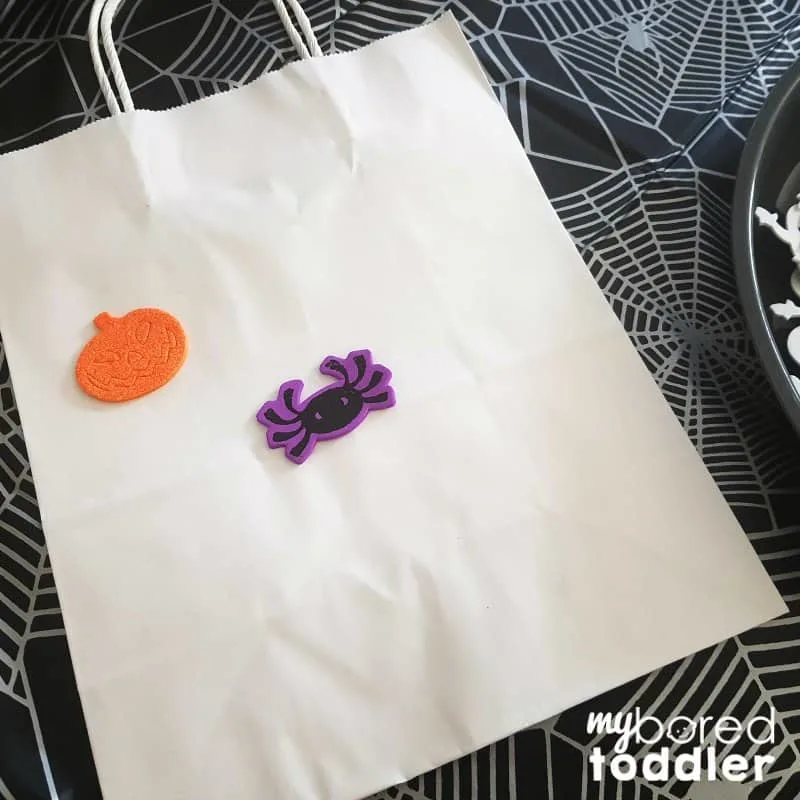 Halloween trick or treat bags craft for toddlers step 1