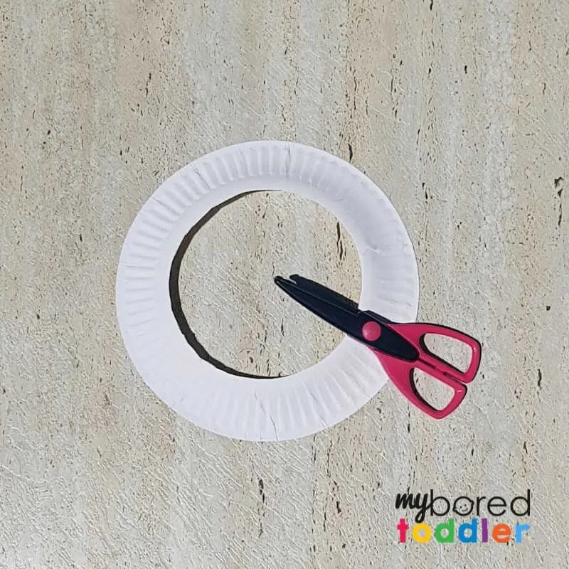 easy sticker christmas wreath for toddlers cutting out the plate