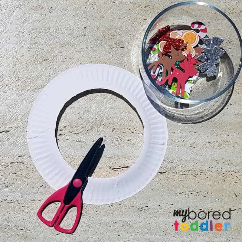 easy sticker christmas wreath for toddlers putting out the stickers