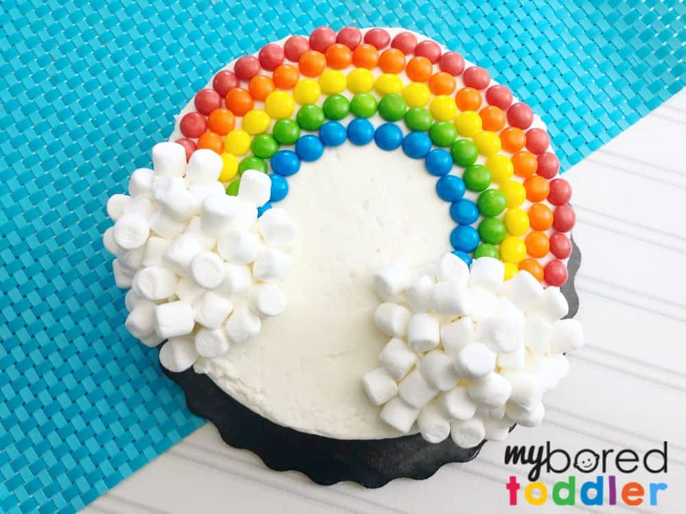 easy rainbow birthday party cake using skittles and marshmallows finished