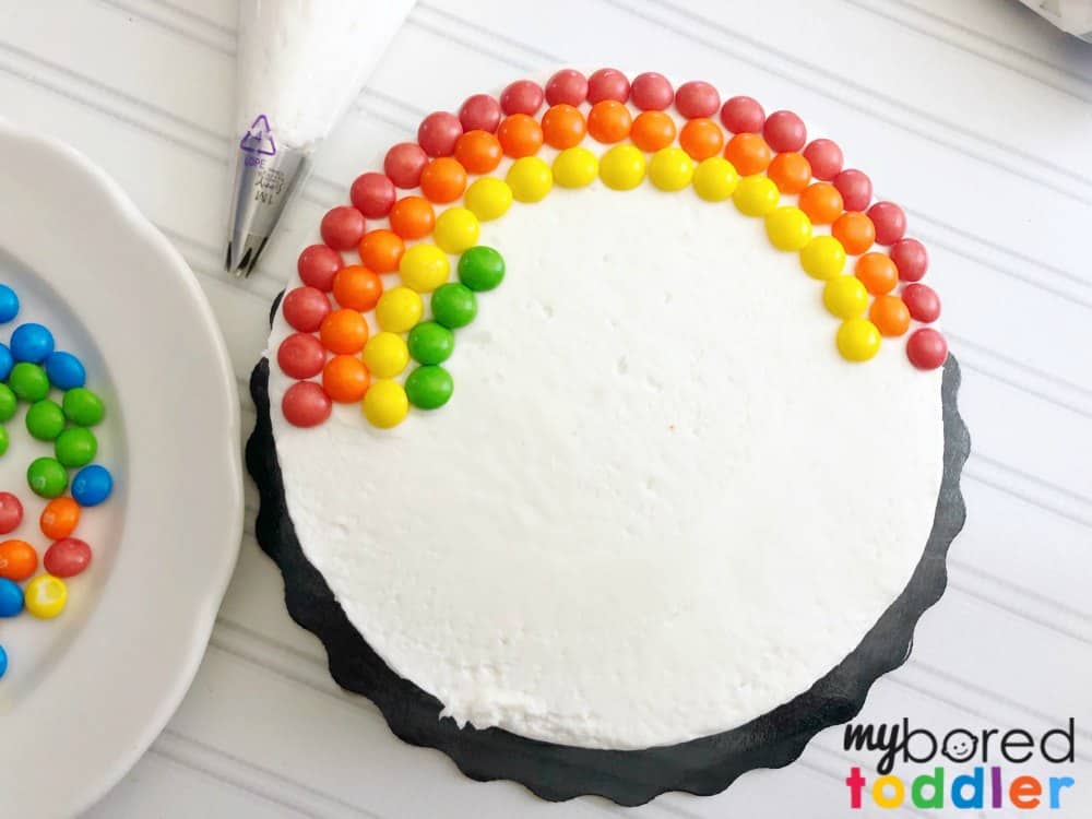 how to make an easy rainbow birthday cake with skittles and marshmallow step 3