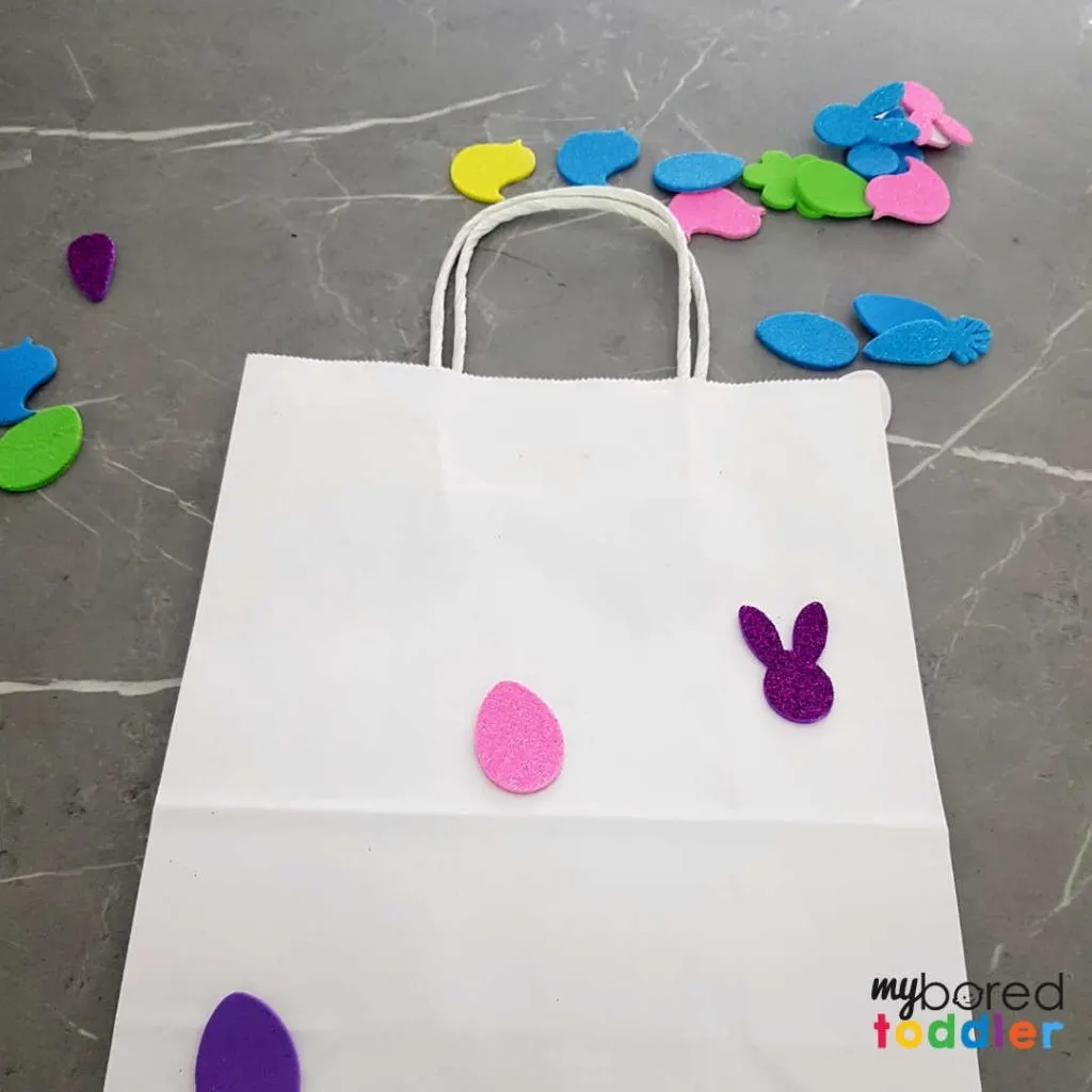 easter gift bags using stickers for toddlers to make step 2