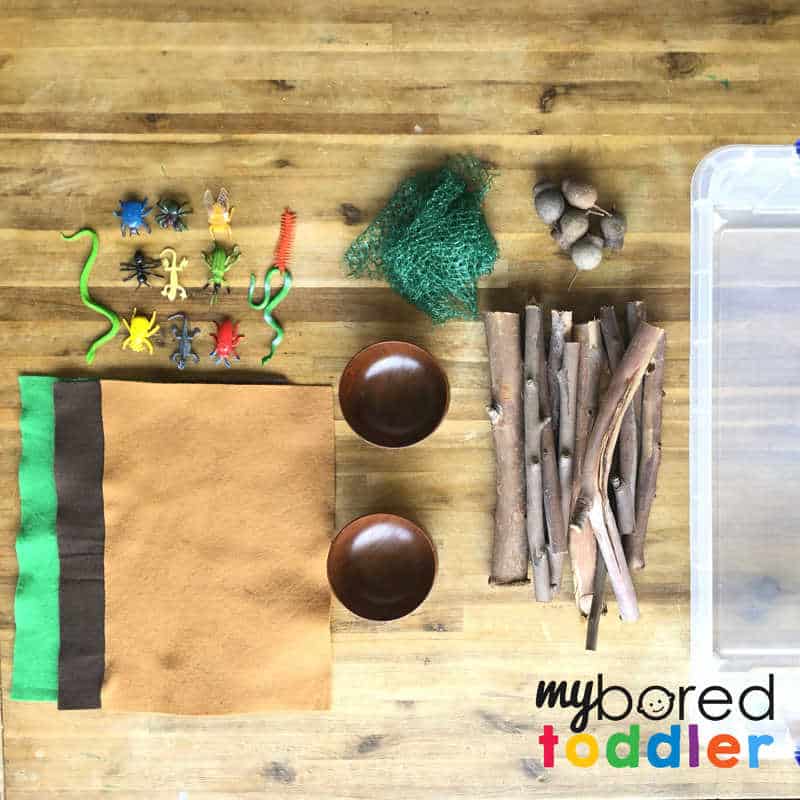 what you need for a sensory wood pile small world play for toddlers