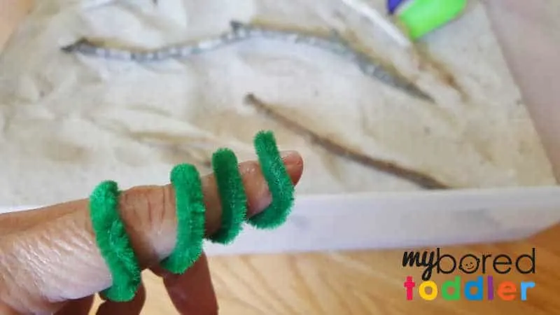 Wrap chenille stem around a finger to make a caterpillar