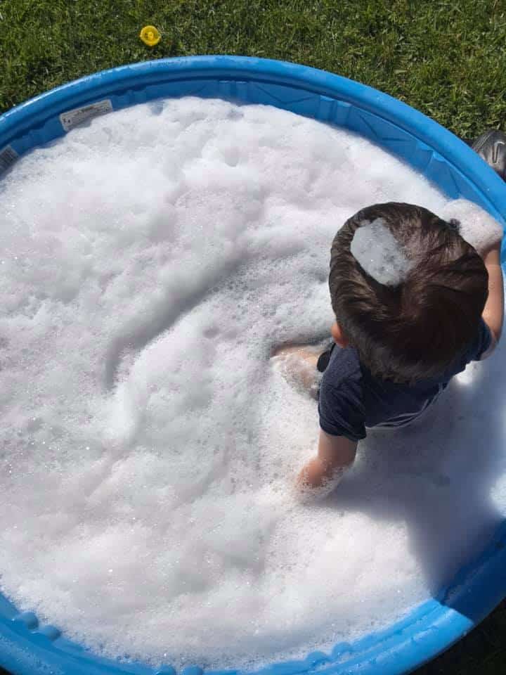 bubbles in the paddle pool water play for toddlers 