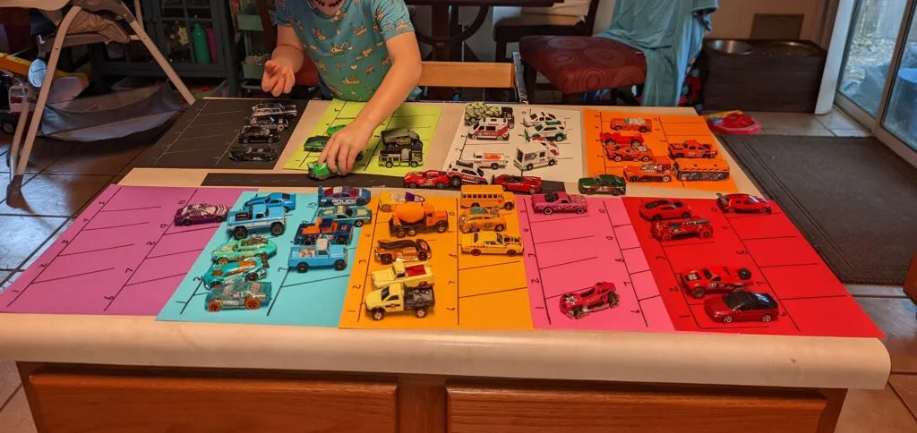 Sorting cars and trucks by color - shared by Codi