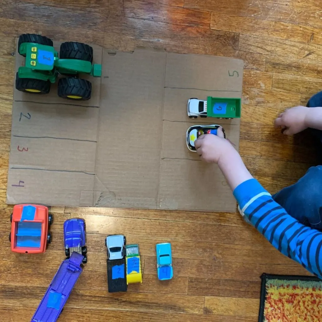 make a parking lot out of cardboard toddler activity