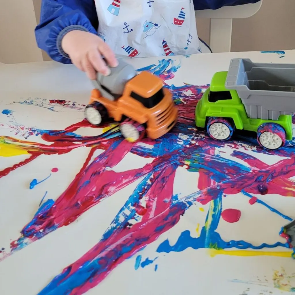 painting with trucks toddler activity