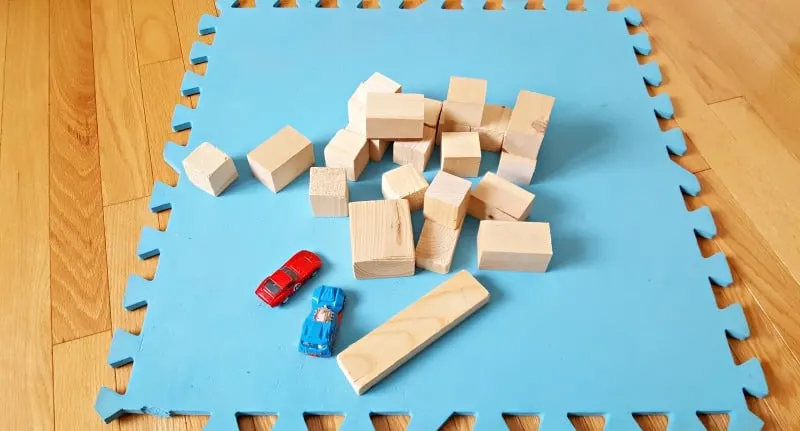 Blue foam building blocks allow kids to create structures and