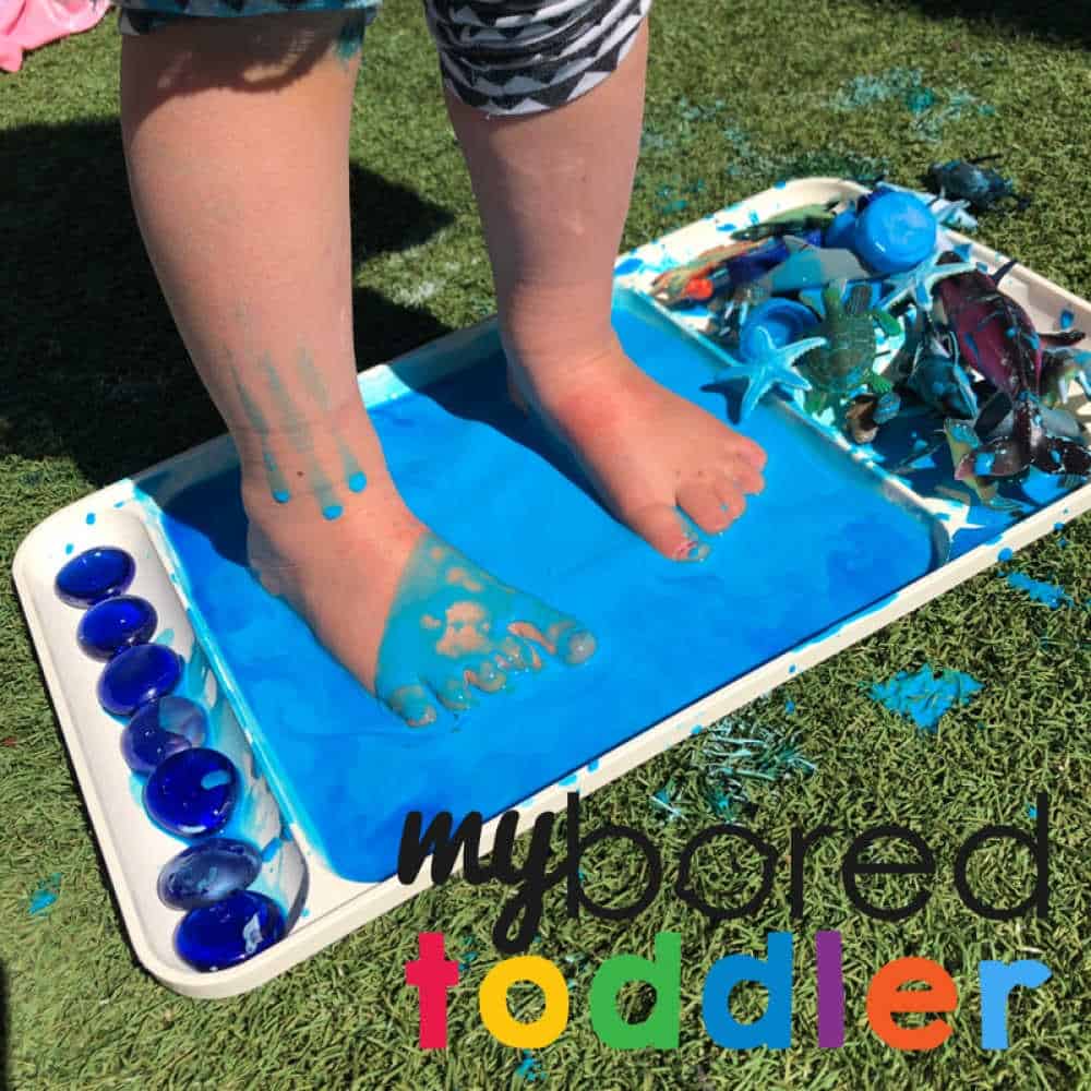 stomping in oobleck messy play sensory fun