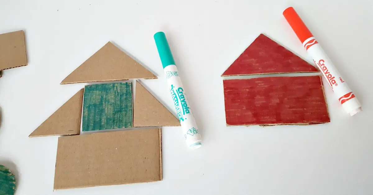 Color cardboard shapes with crayons or markers