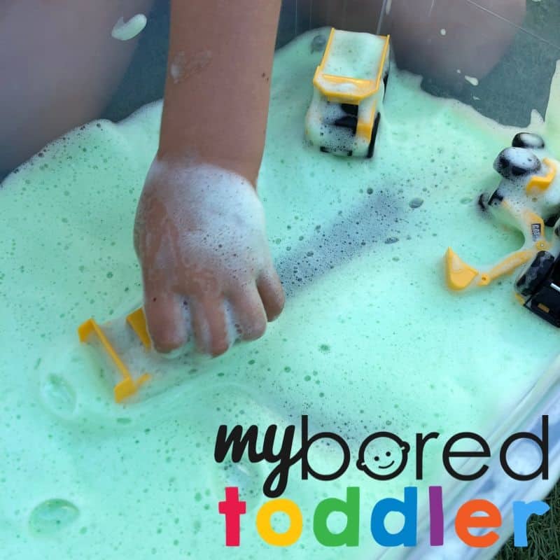 soap foam sensory play with trucks