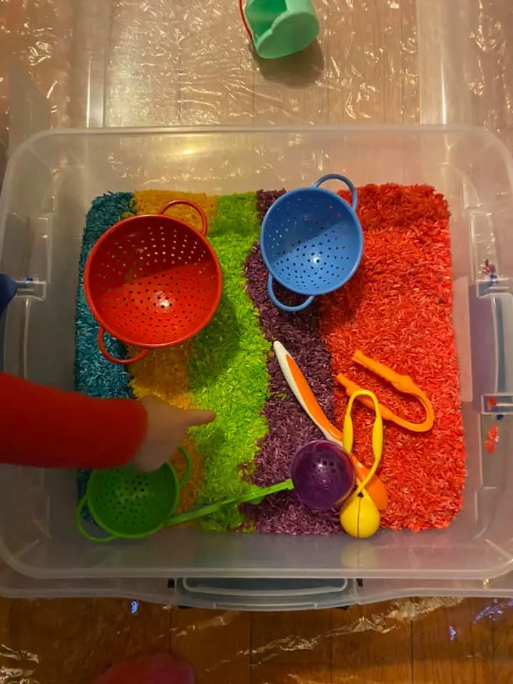 colored rice & fine motor tools sensory bin for toddlers 