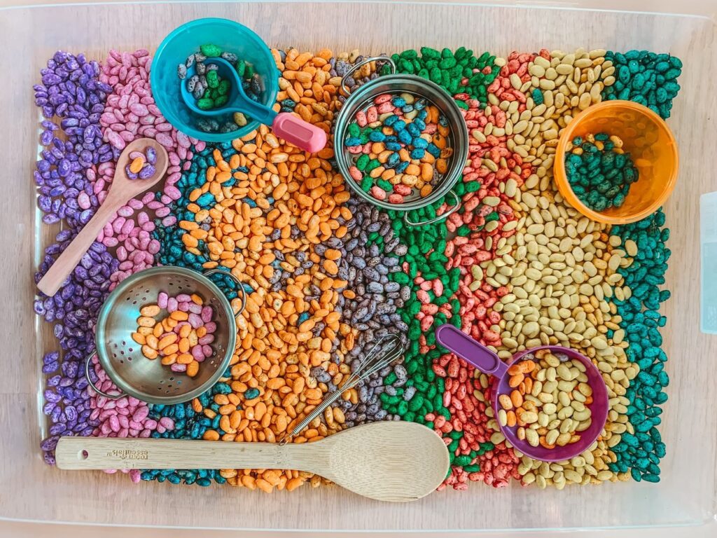 how to play with a magic bean sensory bin for toddlers and preschoolers