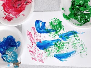 Painting with Recycled Wrapping Paper - My Bored Toddler