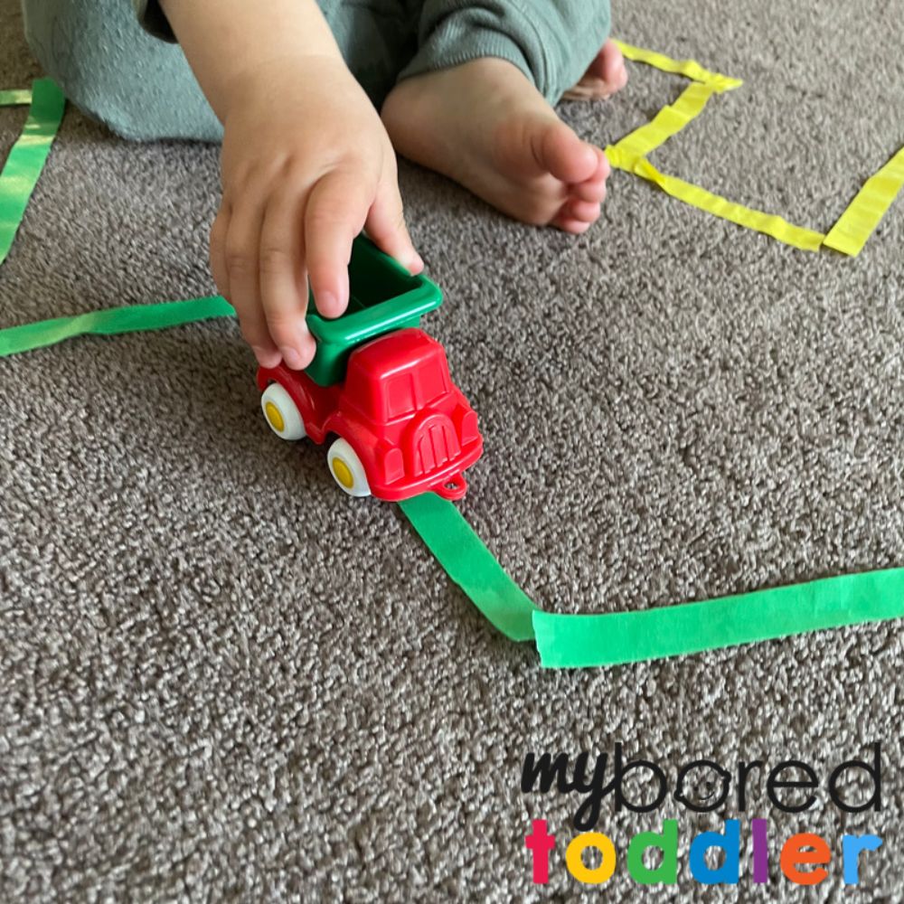 Colored Tape Race Tracks - My Bored Toddler Gross Motor Skill Activity!