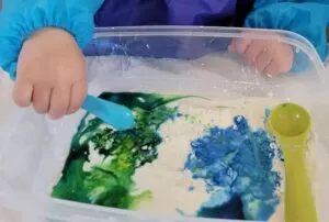 Earth Day Oobleck cornflour water and food coloring