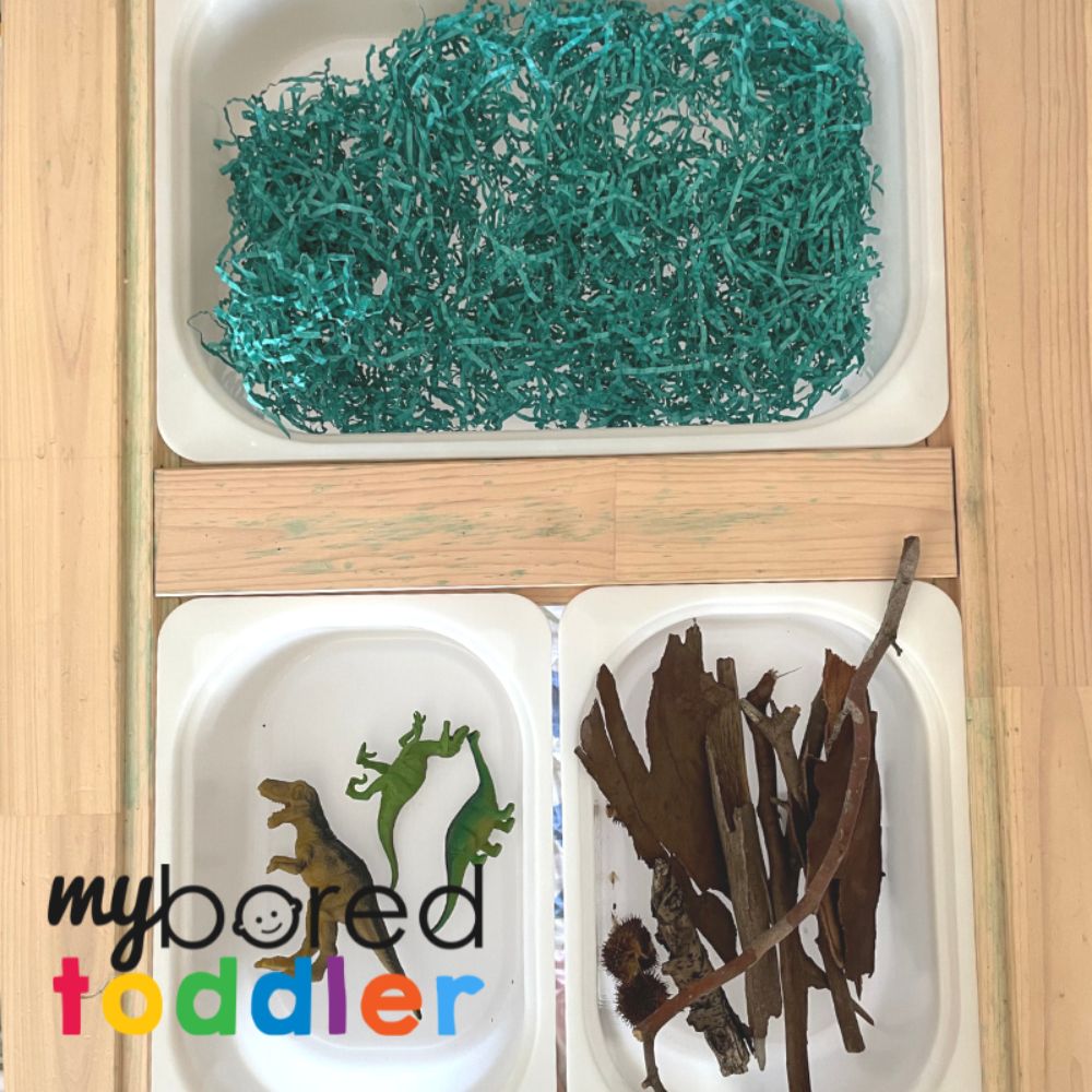 Dinosaur Sensory Bin from Shredded Paper