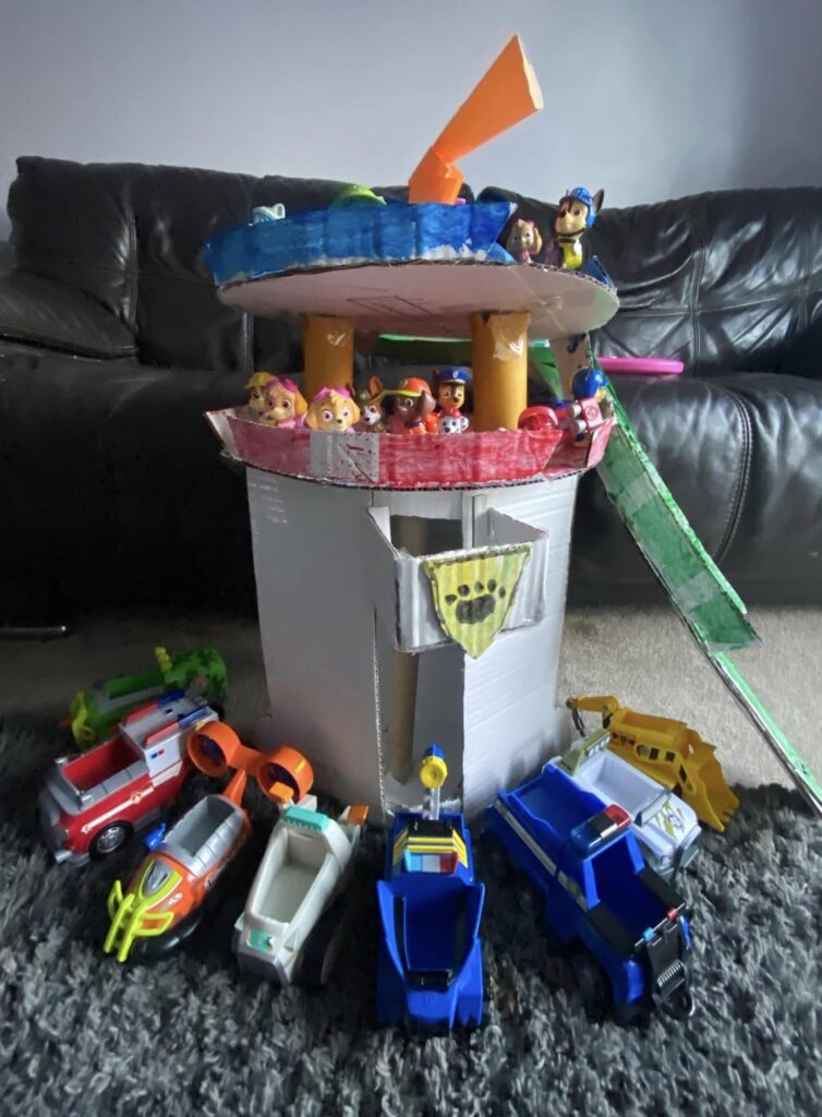 building a tower from boxes toddler activity 